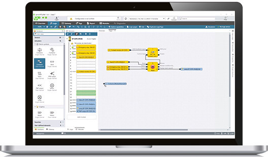 Laptop zeigt samos PLAN6 Sicherheitssoftware mit grafischen Funktionsblöcken, Drag-and-drop Programmierung.